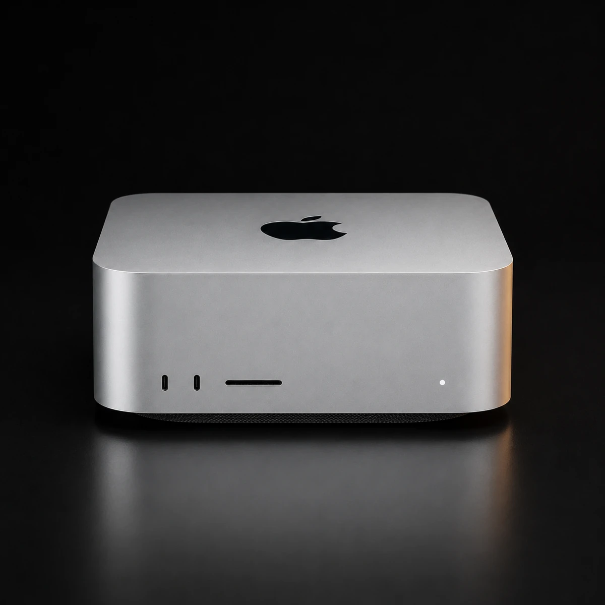 An Apple Mac Studio photographed against a dark background
